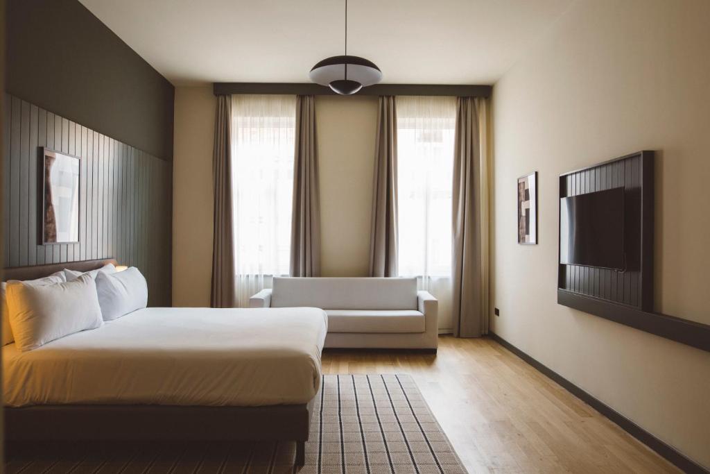 Cama o camas de una habitación en The Honest Budapest by Chic & Basic