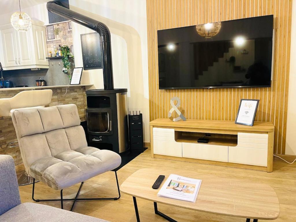 Et tv og/eller underholdning på La maison de la Petite Martinières