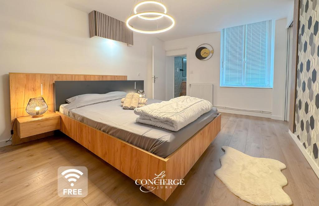 Ένα ή περισσότερα κρεβάτια σε δωμάτιο στο Elégant et Calme au cœur du Centre-ville