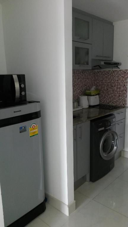 Kuchyň nebo kuchyňský kout v ubytování Khiang Talay Condo