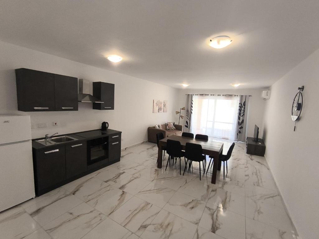 Η κουζίνα ή μικρή κουζίνα στο Il-Gawwija Suite Sannat