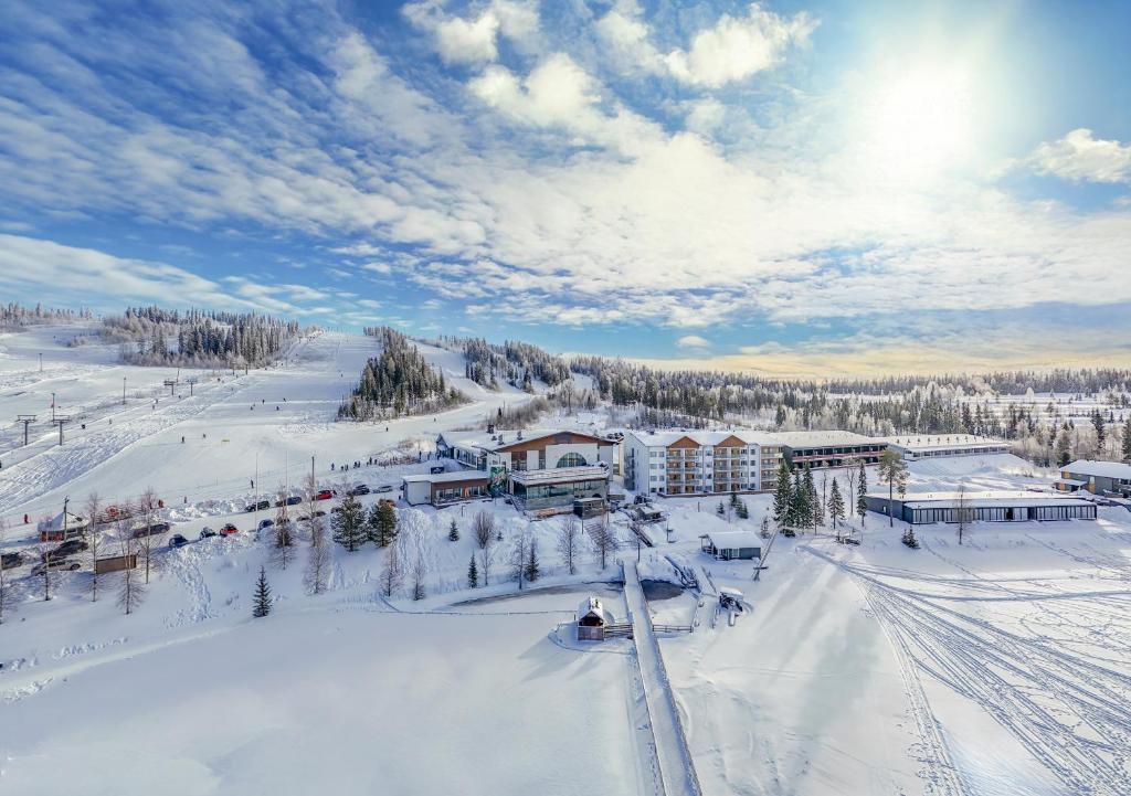 an aerial view of a ski resort in the snow at Ukkohalla Chalets in Hyrynsalmi