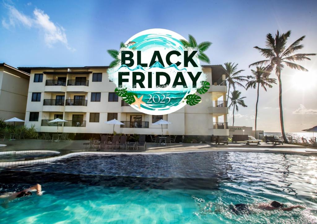 a pool with a black friday sign in front of a hotel at Catussaba Suítes Resort in Salvador