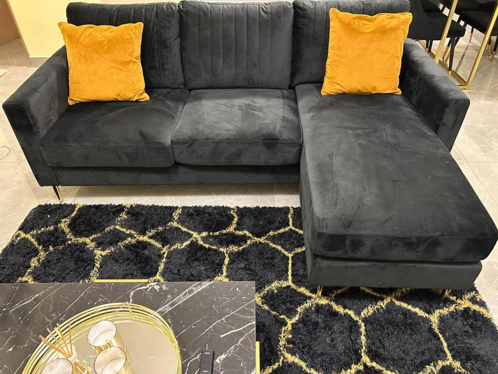 O zonă de relaxare la Charming Kingston Apartment with City Views