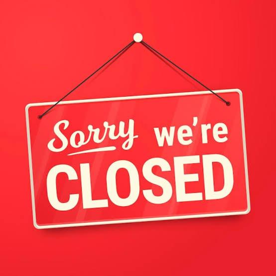 a red sign that says sorry were closed at Villa pak joni in Pasuruan
