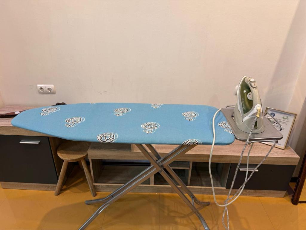 a surfboard sitting on top of a table at CENTRUM 22 RESIDENCE Ap II in Sibiu