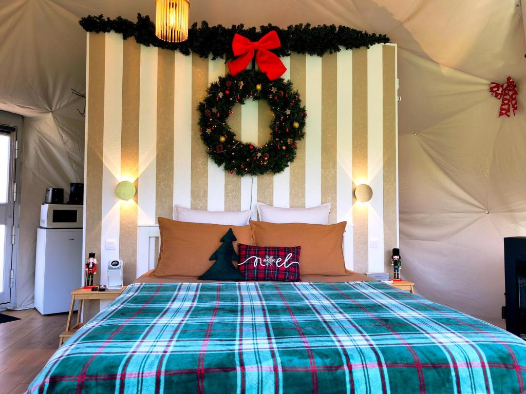 Postel nebo postele na pokoji v ubytování Dôme Saint-Eloi