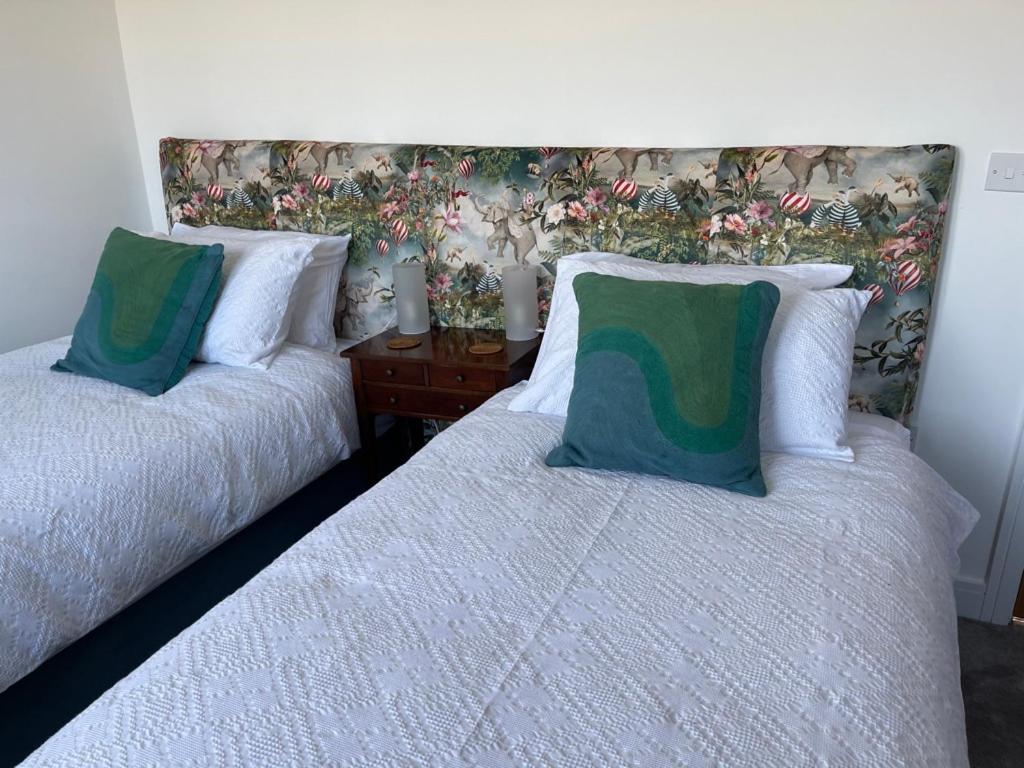 Postel nebo postele na pokoji v ubytování The Pink House