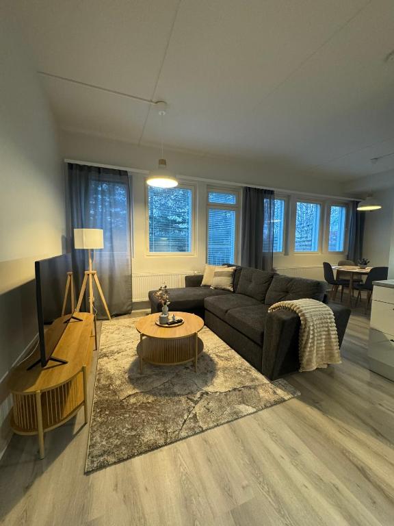 Posezení v ubytování Pramea Apartments Tourula