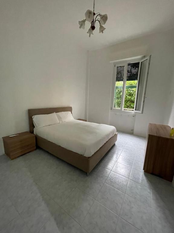 Postel nebo postele na pokoji v ubytování Rosa