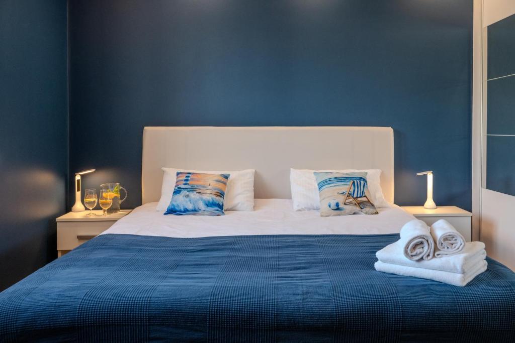 Postel nebo postele na pokoji v ubytování DreamHouse Apartament Zefir Północna 18B, Darłówko Wschodnie