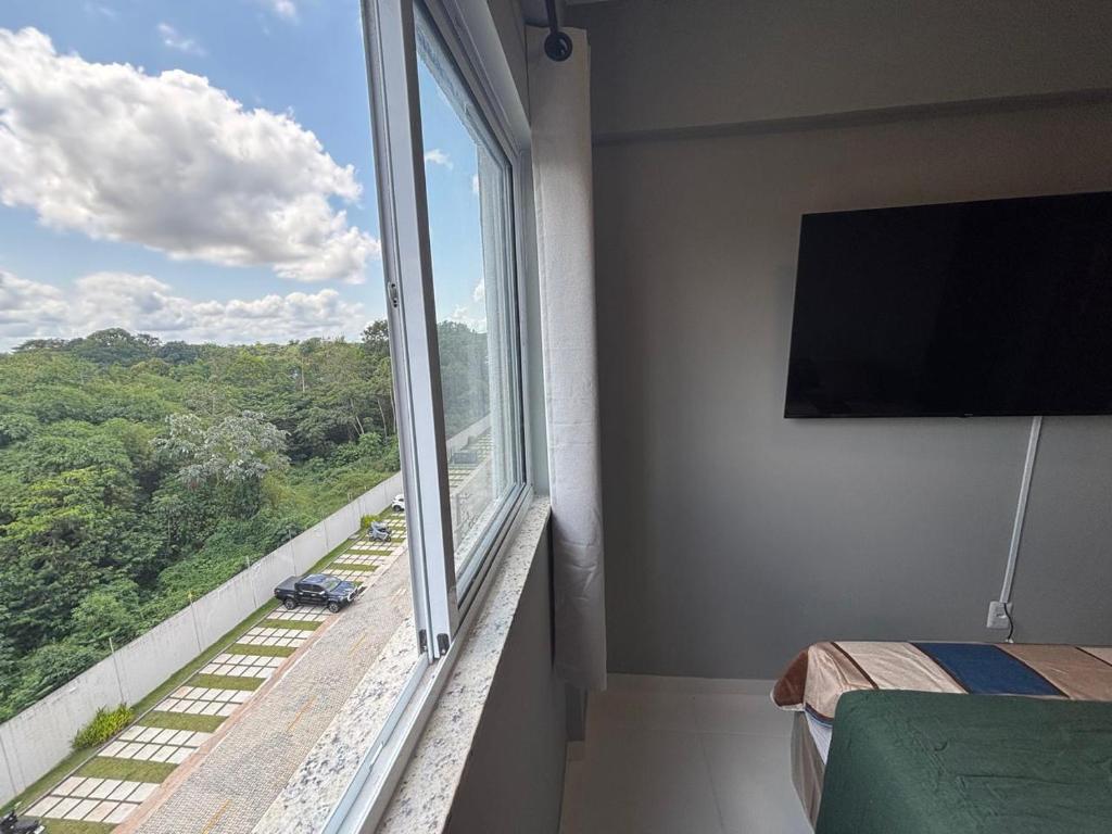 TV a/nebo společenská místnost v ubytování Apartamento Completo com piscina e play infantil