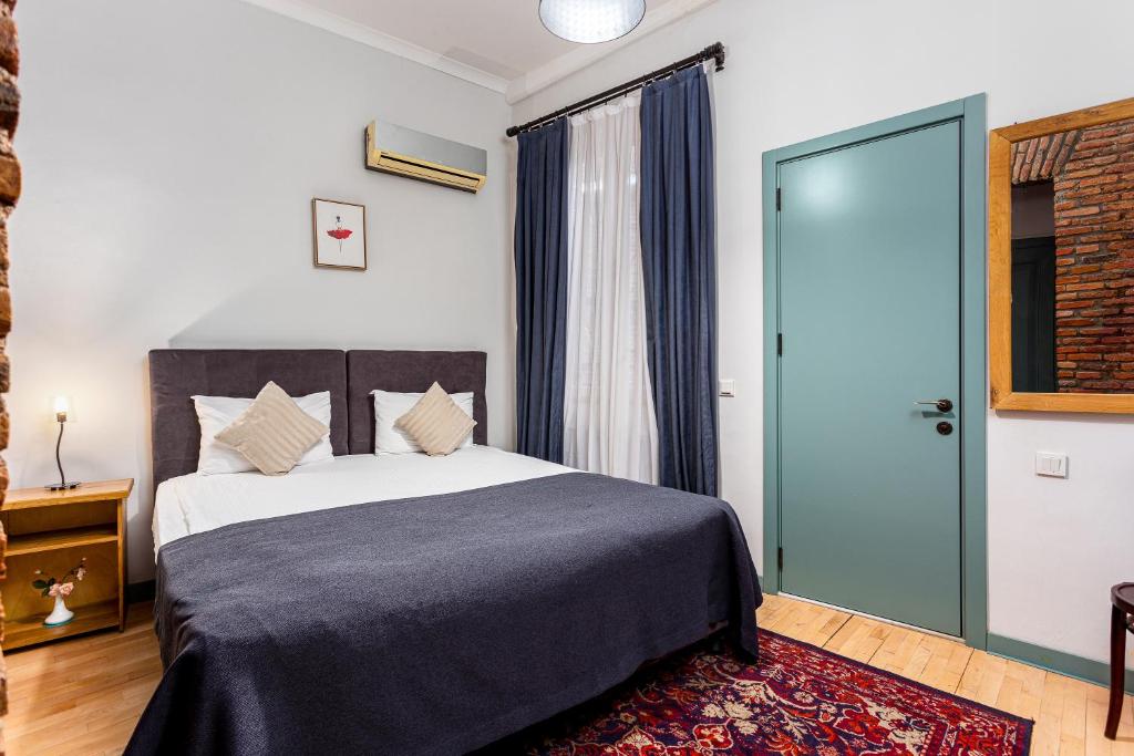 Ένα ή περισσότερα κρεβάτια σε δωμάτιο στο Ethnograph