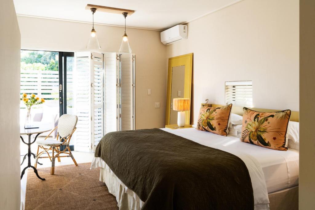 Ένα ή περισσότερα κρεβάτια σε δωμάτιο στο Christiana Lodge