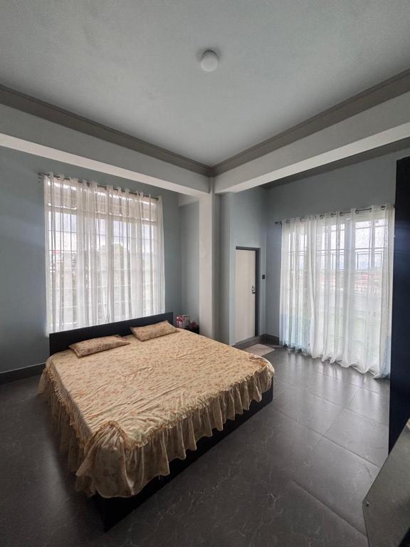 Ένα ή περισσότερα κρεβάτια σε δωμάτιο στο Leedors bnb