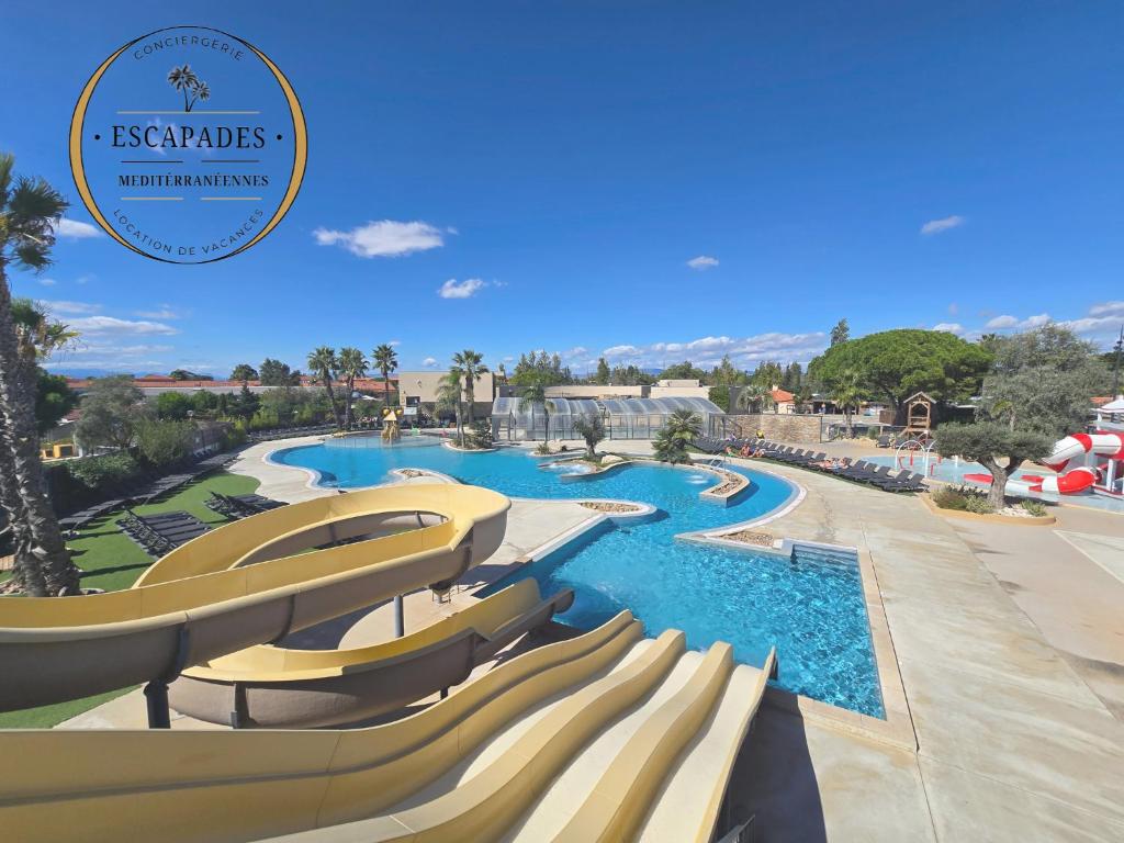Πισίνα στο ή κοντά στο L'Azura Mobil Home à 150m de la Plage Parc Aquatique Camping 5 étoiles