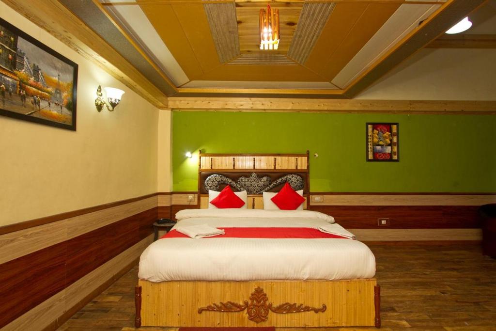 Postel nebo postele na pokoji v ubytování ishaan resorts