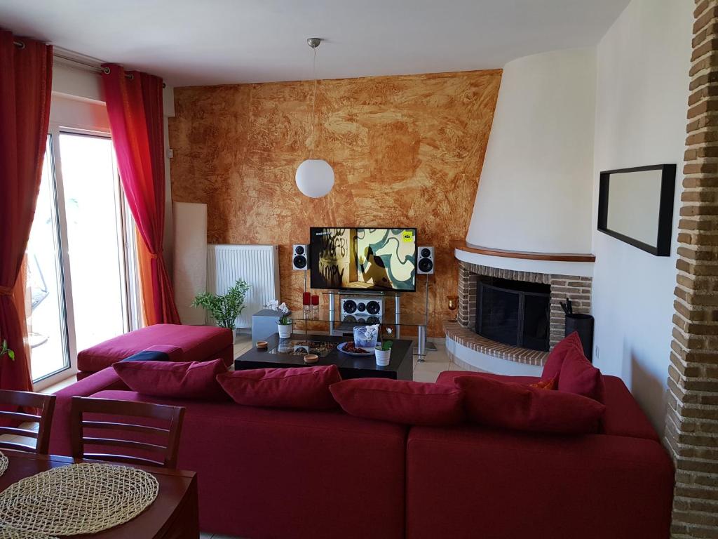 TV a/nebo společenská místnost v ubytování Seaside Paradise - Elegant & Modern Apartment