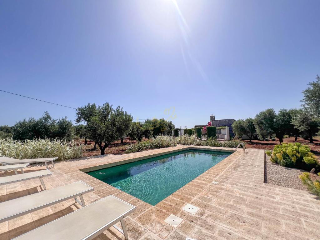 Πισίνα στο ή κοντά στο TD Torretta Macramè amid the Mediterranean scrub