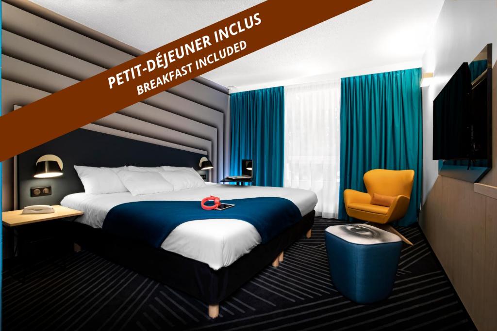 Ένα ή περισσότερα κρεβάτια σε δωμάτιο στο ibis Styles Avignon Sud