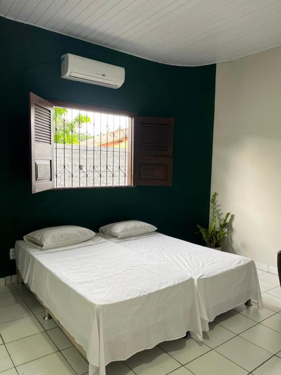 Postel nebo postele na pokoji v ubytování Estação 48