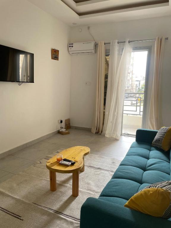 TV a/nebo společenská místnost v ubytování Keur back to teranga Cozy F2 calme aux Mamelles