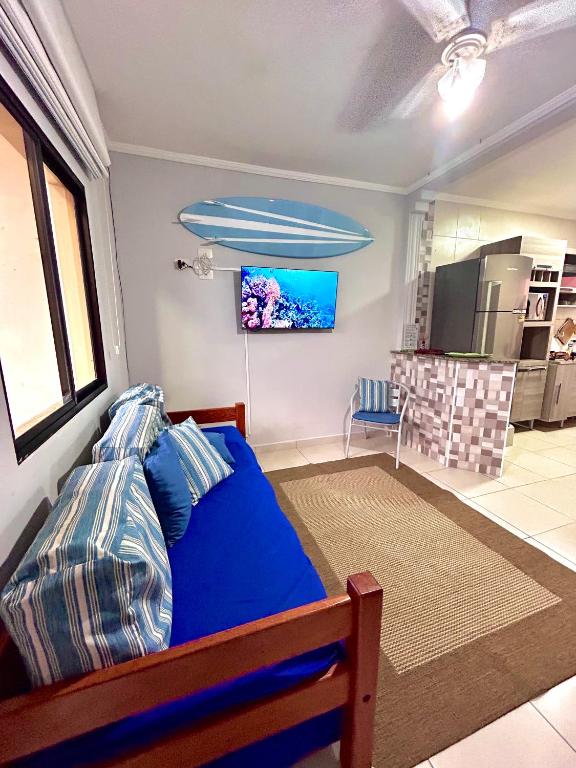 Ένα ή περισσότερα κρεβάτια σε δωμάτιο στο Apê Ubahê Maranduba Ubatuba