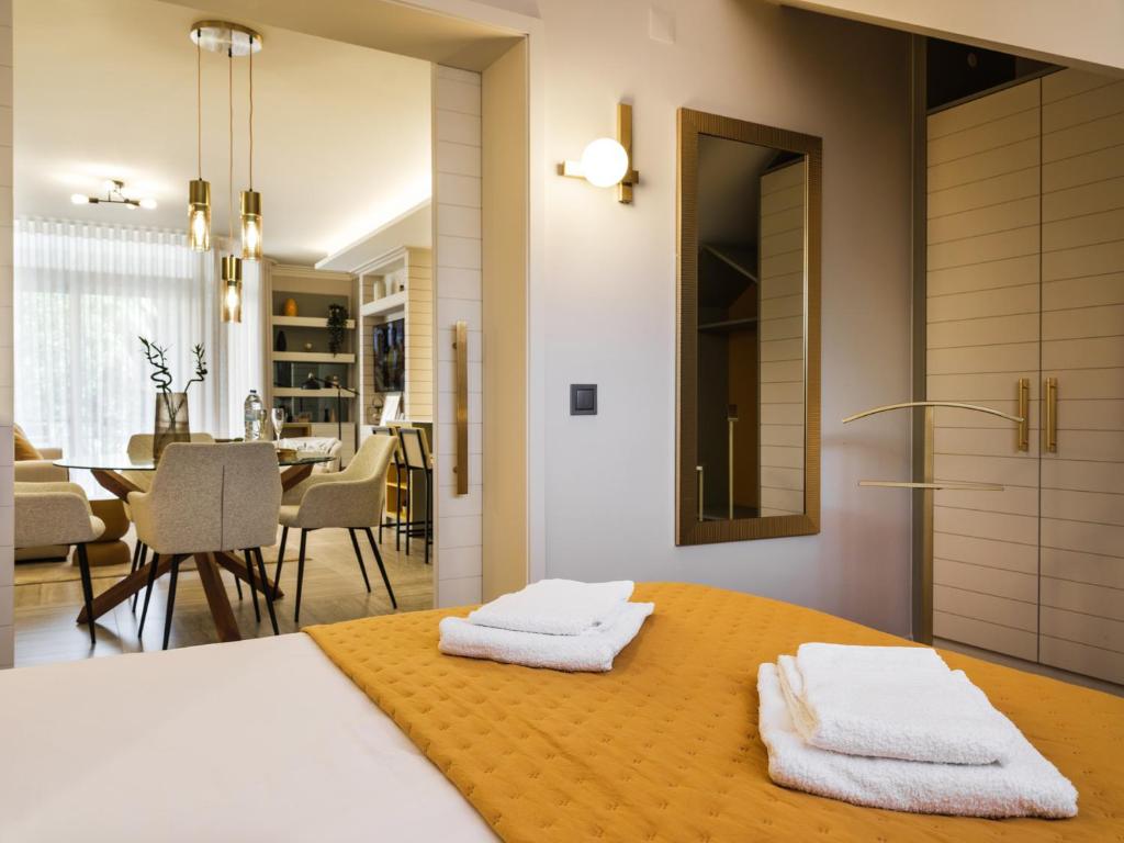 En eller flere senge i et værelse på Apartamento T1 Luxo Marina Vilamoura