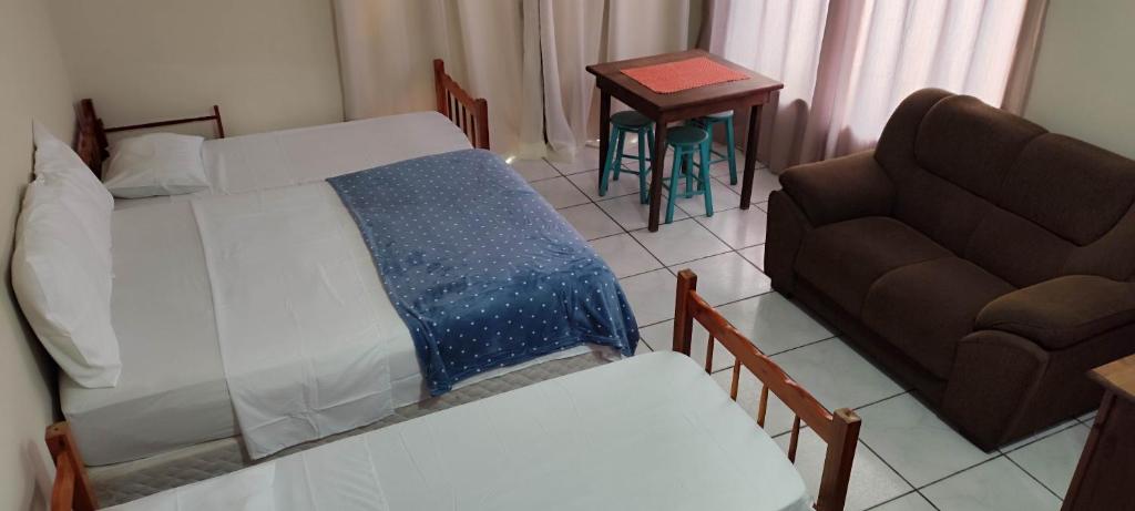 Postel nebo postele na pokoji v ubytování Margarida pousada