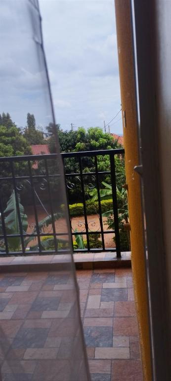 a view of a balcony from the door of a room at Serenity in Kampala