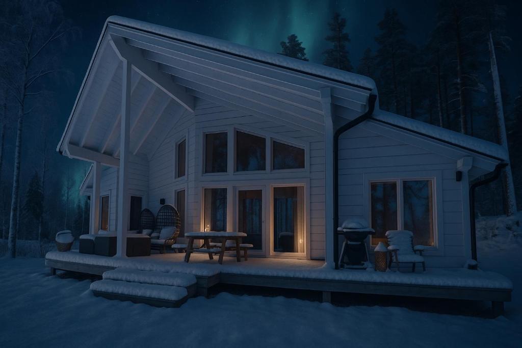 a model of a small house at night at KustaanTähti in Pälkäne