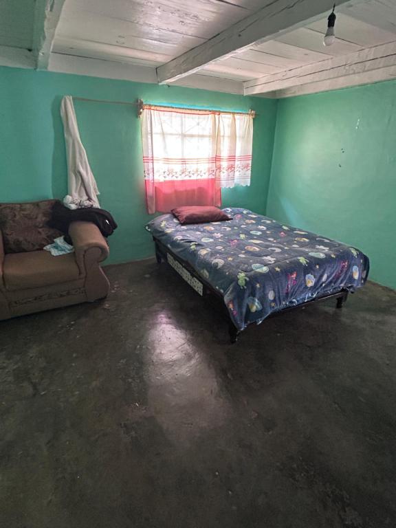 Postel nebo postele na pokoji v ubytování Habitación de Descanso