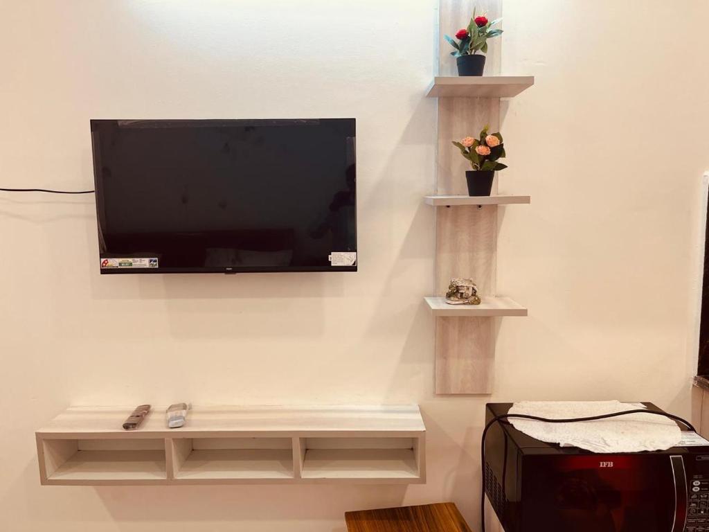 TV a/nebo společenská místnost v ubytování happy stay studio Room's