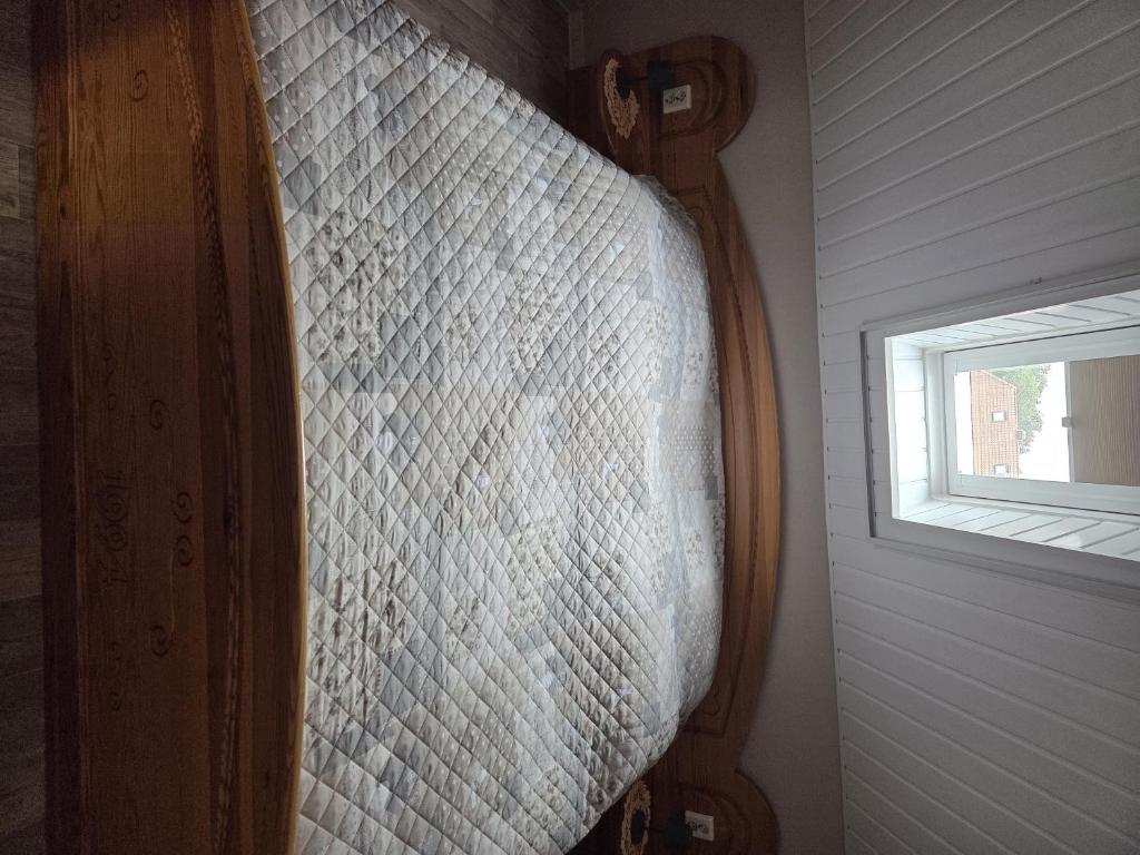 Ένα ή περισσότερα κρεβάτια σε δωμάτιο στο Ferienwohnung Osterende