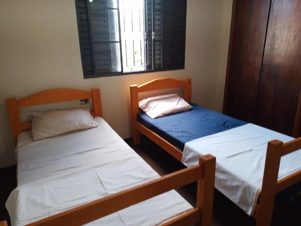 Ένα ή περισσότερα κρεβάτια σε δωμάτιο στο Casa do Comendador