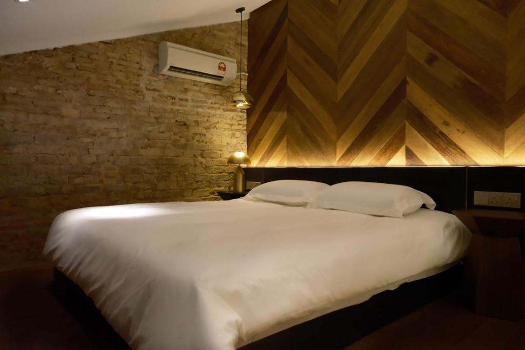 Postel nebo postele na pokoji v ubytování Playce Hotel