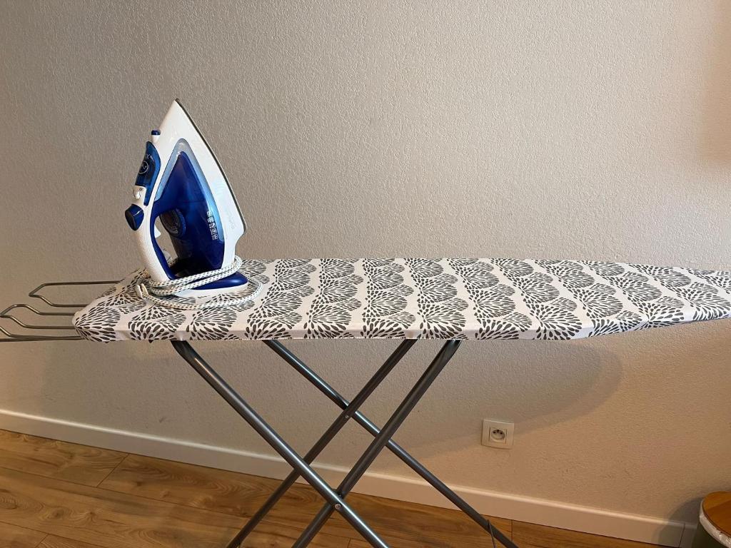 a computer monitor sitting on top of a table at Appart'Hotel - Gare TGV - Courtine - Confluence - 411 in Avignon
