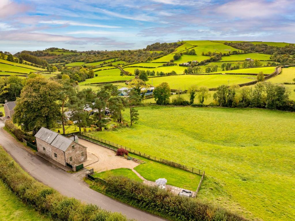 an aerial view of a farm in a field at Waun Yscir Rural escape in the Brecon Beacons in Brecon