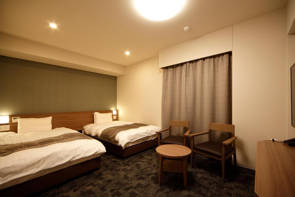 Dormy Inn Nagano tesisinde bir oda