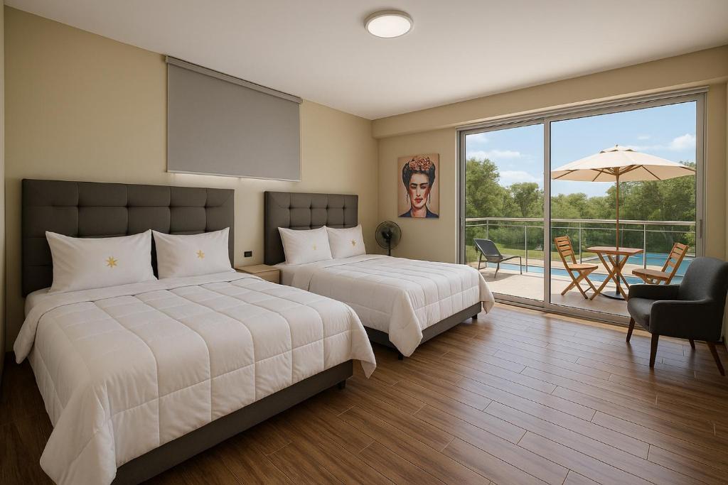 Postel nebo postele na pokoji v ubytování Mar y Lago Premium - EXPERIENCE