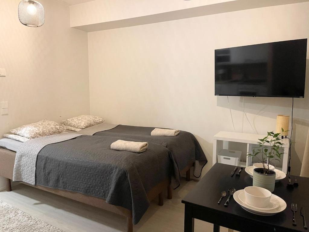 Postel nebo postele na pokoji v ubytování Apartment Tiira