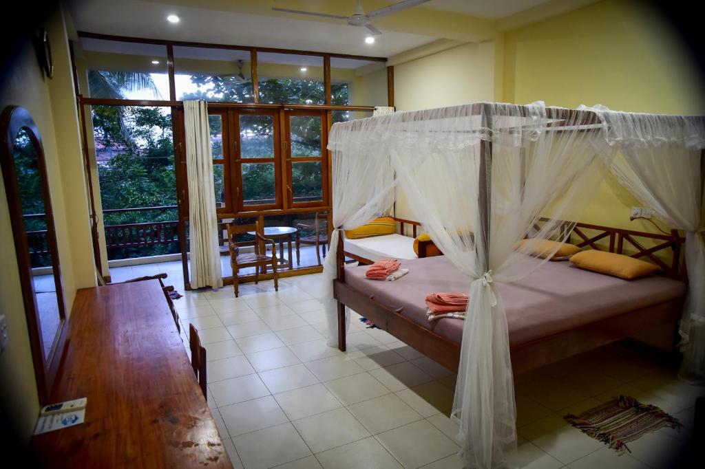 Postel nebo postele na pokoji v ubytování Hotel Finlanka