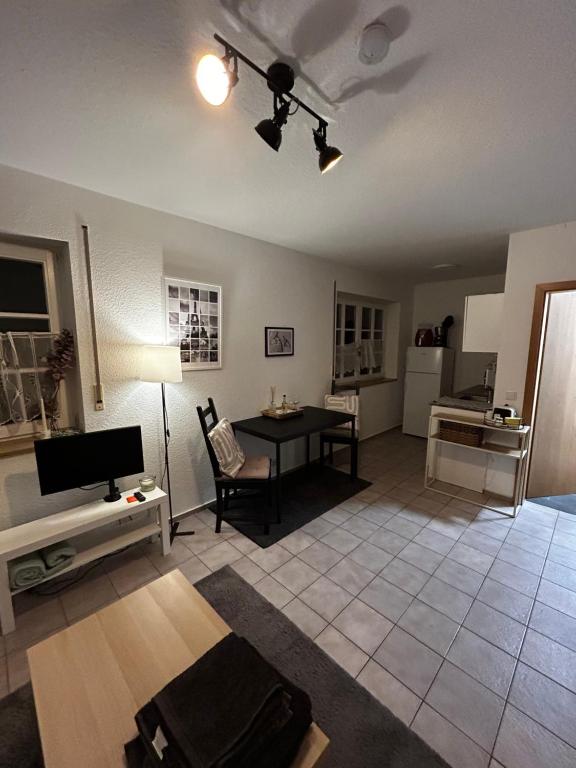 TV a/nebo společenská místnost v ubytování Apartment in Rimpar