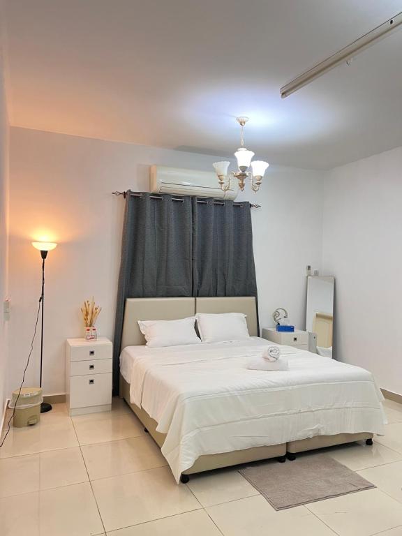 Ένα ή περισσότερα κρεβάτια σε δωμάτιο στο Royale Hostel