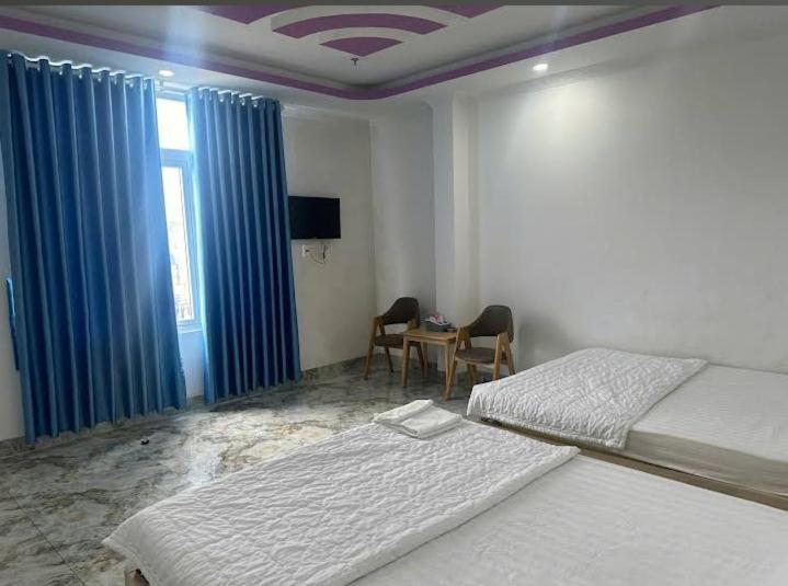 Postel nebo postele na pokoji v ubytování HOTEL Ly Ly