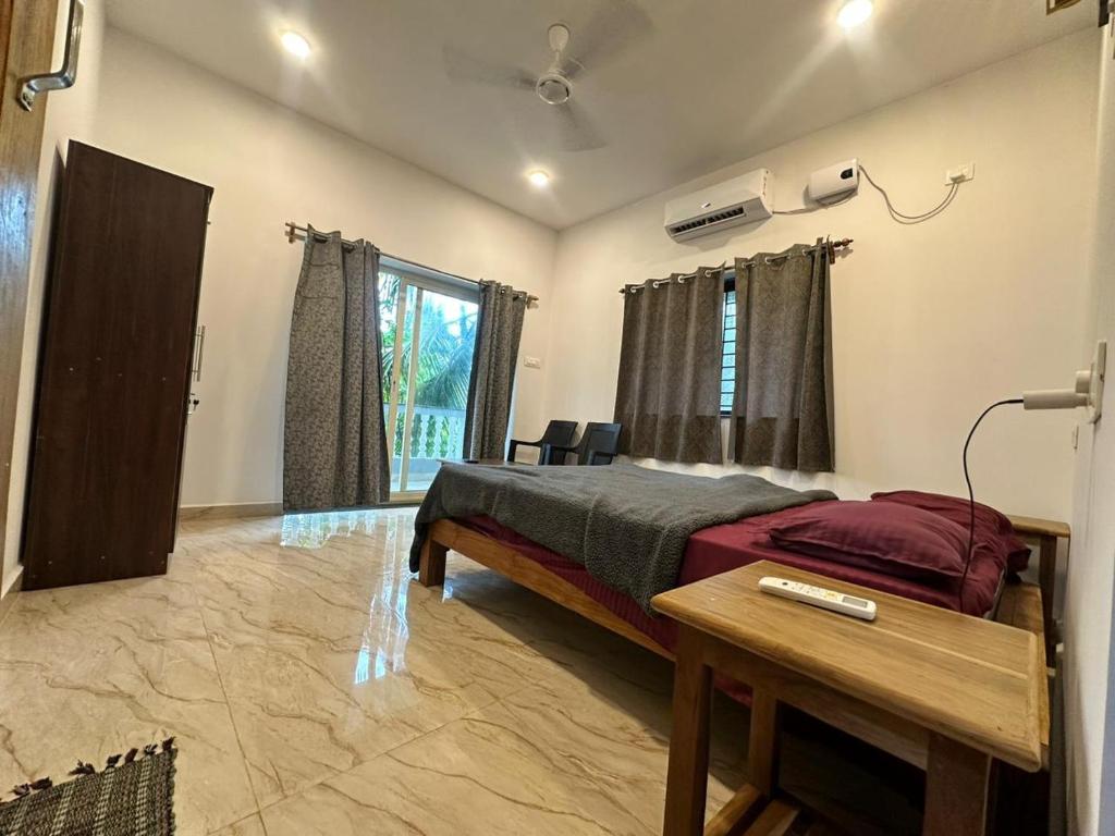 Ένα ή περισσότερα κρεβάτια σε δωμάτιο στο Morjim bliss