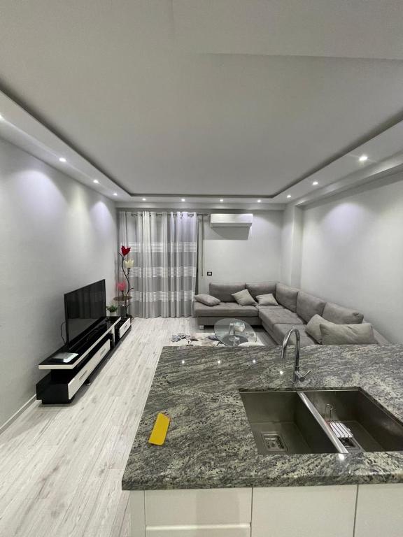 TV a/nebo společenská místnost v ubytování Dori's apartament