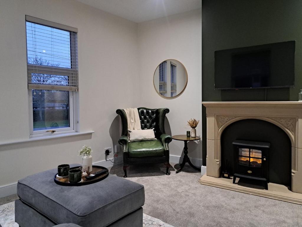 Televiisor ja/või meelelahutuskeskus majutusasutuses Central Park View - Modern & Stylish 2 Bed Apartment - Great Location