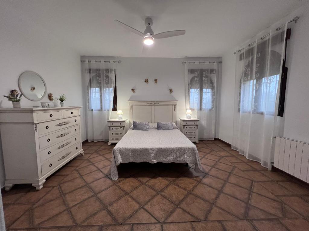 Postel nebo postele na pokoji v ubytování El Carmen