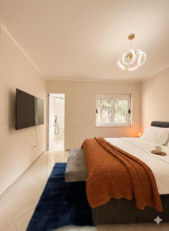 Postel nebo postele na pokoji v ubytování Residence Central Tirana